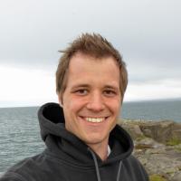 A selfie by Patrick Flick in front of the ocean